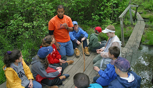 An Environmental Education Intern leads an outdoor class at Echo Hill Outdoor School