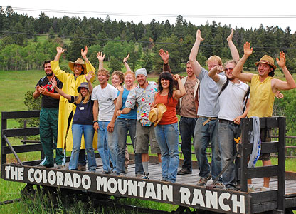 The summer staff at the Colorado Mountain Ranch showing off their spirit on the welcome wagon. The summer staff at the Colorado Mountain Ranch showing off their spirit on the welcome wagon.