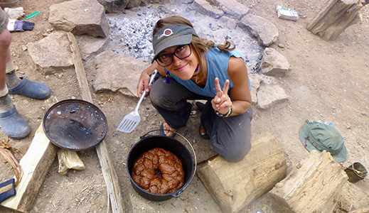 Cooking over an open fire is one of the many skills Field Staff will teach students.