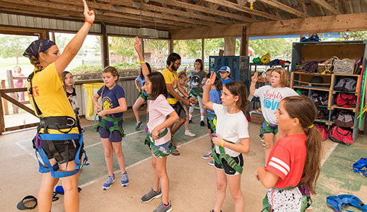 You will help facilitate team building, the climbing wall and high ropes courses.