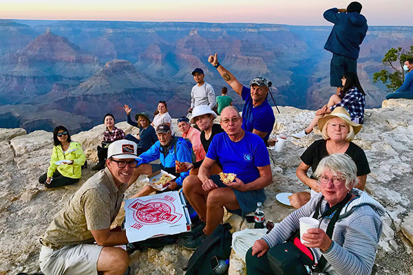 As a Tour Guide for Bindlestiff, you may find yourself poking around an abandoned mining town in the desert southwest, atop a granite peak in Yosemite, in a raft on the Colorado River, hiking on a glacier in the Canadian Rockies, or watching bears catch salmon in a remote Alaskan river!