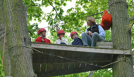 Echo Hill Instructor teaching in the trees